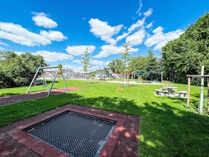 Grass, Outdoor Play Equipment, Public Space, Playground Slide, Park, Garden, Playground, Chute, Lawn, Artificial Turf