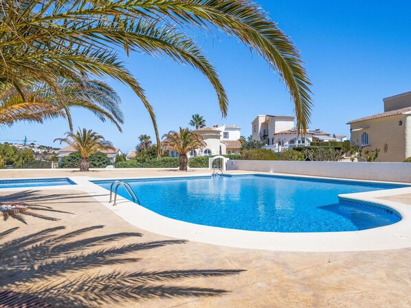 Water, Sky, Property, Plant, Swimming Pool, Azure, Building, Tree, Shade, Arecales