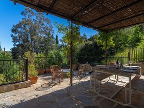 Plant, Sky, Shade, Tree, Table, Outdoor Furniture, Building, Wood, Landscape, Leisure