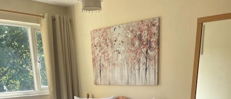 Main bedroom with king bed and fitted wardrobes