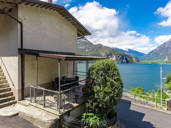 Cloud, Plant, Sky, Property, Water, Building, Mountain, House, Window, Cottage