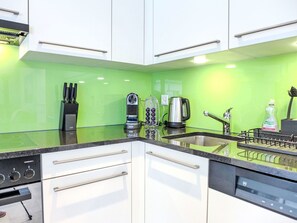 Cabinetry, Countertop, Kitchen Appliance, Kitchen Stove, Kitchen Sink, Kitchen, Home Appliance, Flooring, Floor, Line