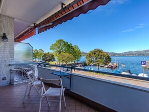 Water, Sky, Shade, Outdoor Furniture, Tree, Chair, Leisure, Real Estate, Wood, Lake