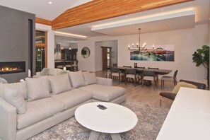 Another view of Grand Room - plenty of seating areas, large screen TV and Gas fireplace