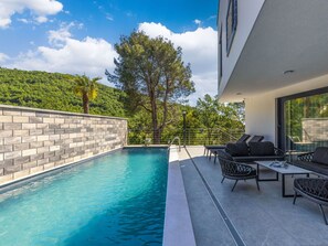 Water, Cloud, Building, Property, Plant, Sky, Furniture, Swimming Pool, Nature, Azure