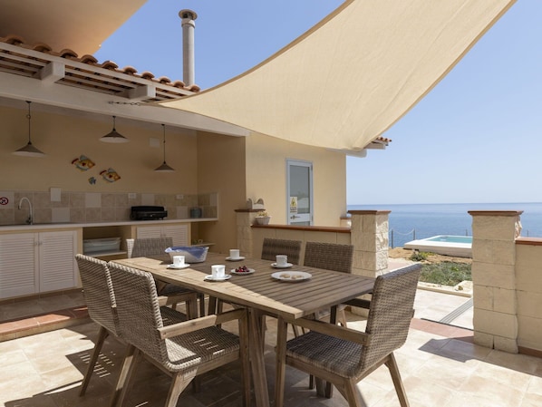 Table, Sky, Property, Furniture, Chair, Building, Azure, Wood, Shade, Outdoor Furniture
