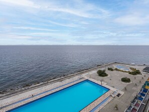 Cloud, Water, Sky, Water Resources, Azure, Coastal And Oceanic Landforms, Swimming Pool, Landscape, Leisure, Condominium