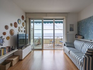 Property, Couch, Building, Azure, Wood, Interior Design, Architecture, Living Room, Bookcase, Flooring