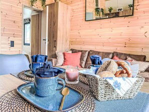 Furniture, Couch, Blue, Window, Table, Building, Azure, Textile, Wood, Living Room