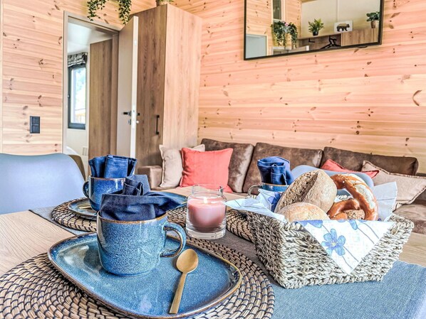 Furniture, Couch, Blue, Window, Table, Building, Azure, Textile, Wood, Living Room
