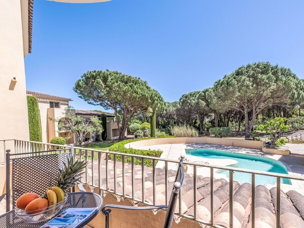 Sky, Plant, Water, Property, Building, Azure, Shade, Tree, Swimming Pool, Outdoor Furniture