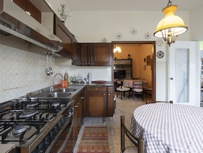 Cabinetry, Furniture, Property, Countertop, Tap, Wood, Lighting, Sink, Interior Design, Kitchen Stove