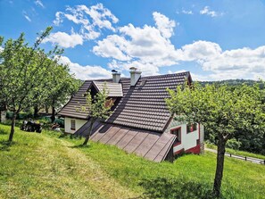 Cloud, Sky, Plant, Natural Landscape, Building, Land Lot, Cottage, Wood, Grass, Grassland
