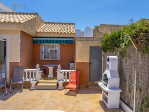 Sky, Plant, Shade, Interior Design, Chair, Building, Window, Wall, Floor, Leisure