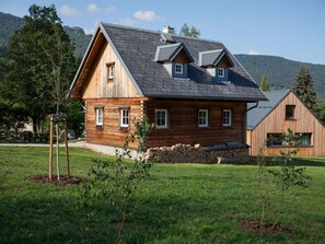 Plant, Sky, Window, Building, Tree, House, Land Lot, Cloud, Grass, Cottage
