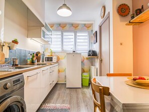 Furniture, Cabinetry, Kitchen Sink, Countertop, Wood, Lighting, Kitchen, Interior Design, Orange, Kitchen Appliance