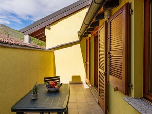 Building, Table, Light, Sky, Wood, Lighting, Shade, Cloud, Interior Design, Yellow