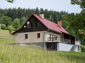 Sky, Plant, Building, Window, Tree, Land Lot, House, Natural Landscape, Grass, Cottage