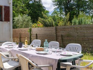 Table, Furniture, Plant, Chair, Tableware, Tree, Tablecloth, Outdoor Furniture, Outdoor Table, Cloud