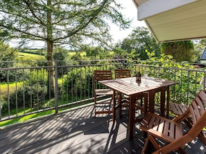 Table, Furniture, Sky, Plant, Property, Building, Tableware, Chair, Outdoor Table, Outdoor Furniture