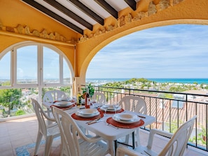 Sky, Table, Property, Furniture, Building, Plant, Chair, Window, Outdoor Table, Tableware