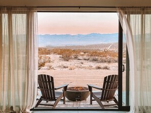 Fire pit off the front porch with gorgeous, endless desert mountain views