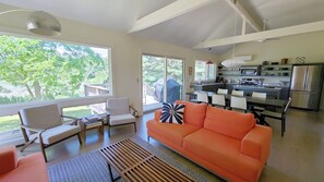 Main living area has a vaulted ceiling and is open and bright