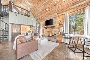 Relax in our cozy living room that has a Smart TV and a fireplace.