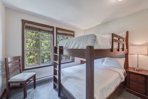 Bright room with bunk beds, great for kids or extra guests.