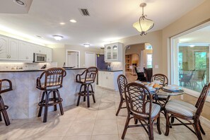 Dining & Entertaining - - A cozy dining nook and bar seating provide options for meals and conversation
- Large windows and open views keep the space bright and inviting
- Whether it’s a quick breakfast or a family dinner, this space is ready to host