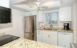 Kitchen - Fully equipped kitchen with granite countertops.