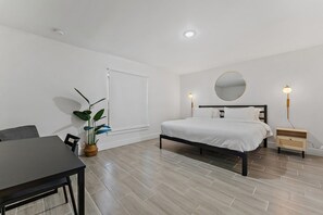 Master bedroom with comfortable king size bed and high quality bed sheets