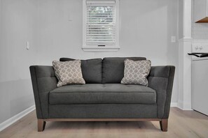 Perfect size couples couch to cuddle up and catch up on your favorite Netflix show after a busy day of exploring