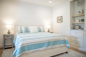 Primary bedroom with King bed and large Smart TV