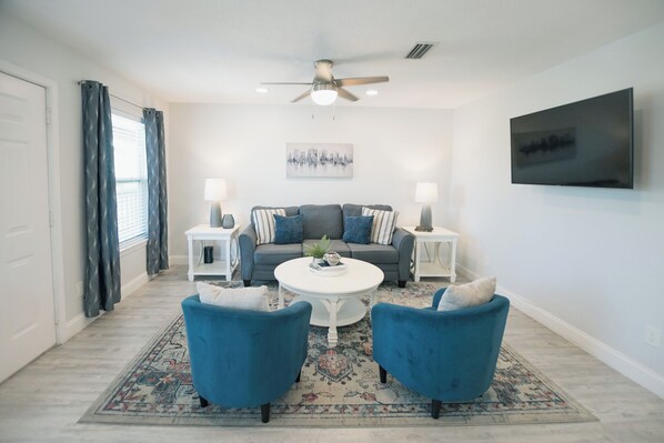 Welcome! Enter into the spacious living room.