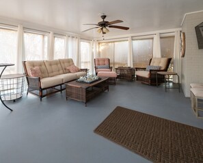 This sun porch is a great place to relax