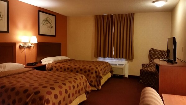 Unit with 2 Double Beds. Exact unit will be assigned upon arrival. Views, colors and decor may vary.