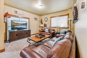 Bonus Room: 2 couches, 1 leather chair, 52” TV, games, access to the lower level deck, and hot tub