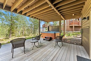 Exterior: Lower deck, outdoor seating, private hot tub