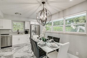 Dining Area | Central Heating & A/C | Free WiFi