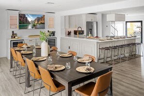 Enjoy seamless dining with our adjacent dining area for 10, right next to the kitchen
