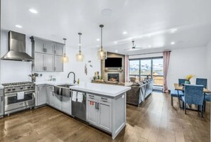 Modern kitchen with gourmet appliances, offering a great space to prepare delicious meals.