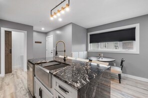 The open kitchen/dining space is perfect for entertaining the whole group!