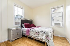 Sunlight, simplicity, and a sense of calm define this restful space.
