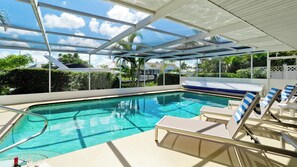 Pool - Shaded and sun under the screened in pool area.