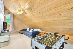 Loft with a foosball table