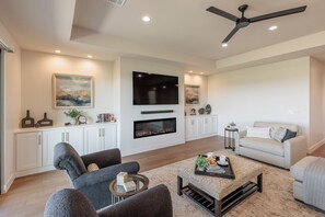 Main Living Area - Turn on the fireplace and relax in comfort while you watch your favorite movie.