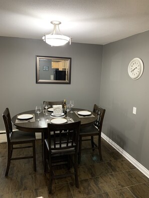 Dining Room. Place settings for 4 guests.