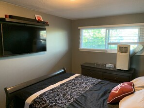 Guest bedroom 2 layout. Smart TV with Sasktel cable box and Chromecast.
