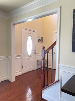 Welcome to BLUE where your stay begins in the 2 story high foyer.